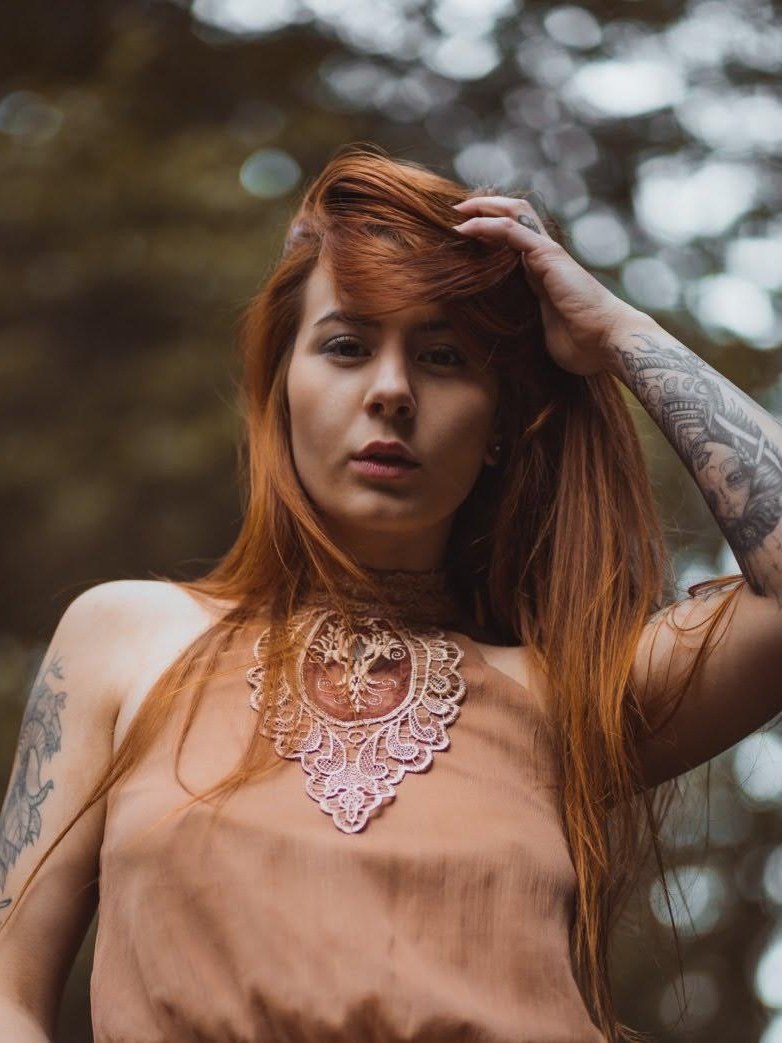 Portrait of byliv in a rose lace dress