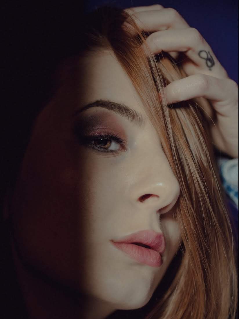 Close-up portrait of byliv in warm low light